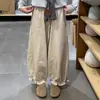 Temporada de primavera y otoño, bombachos florales cortos para mujer con cintura elástica, corte holgado, efecto adelgazante, adecuados para figuras petite, pierna ancha, estilo linterna, pantalones tapered en el tobillo, estilo transfronterizo, tela gruesa