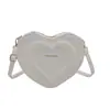 Bolso Pequeño de Moda en Forma de Corazón Otoño 2026 Nuevo Elegante Bolso Cruzado con Relieve Diseño de Nicho Ins Bolso de Hombro
