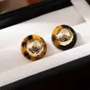 Brincos clássicos estilo Maillard com estampa de leopardo, contas redondas irregulares e pinos de prata, novos brincos europeus e americanos com pedras de olho de tigre incrustadas para mulheres