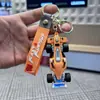 Llavero Creativo de Dibujos Animados Modelo de Carreras de Fórmula Colgante para Mochila Muñeca Exquisita Cadena para Llaves de Coche Pequeño Regalo