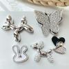 Taladro de punto nuevo mariposa integrada bola de mariposa perro taladro de punto agujero de amor zapatos hebilla de zapato material accesorios funda de teléfono móvil
