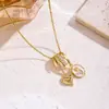 Collar de Acero de Titanio con Circonita para Mujer 2026 Nuevo Estilo Moda de Alta Gama Versátil Elegante Colgante de Cobre Microincrustado Joyería al por Mayor