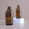Botellas Boston ámbar personalizadas, botellas de vidrio dispensadoras de aceites esenciales originales, envases farmacéuticos en varias especificaciones