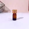 Botella gotero de vidrio engrosado con tapa de bambú, portátil, para dispensar, a prueba de luz, adecuada para muestras pequeñas, compatible con doTERRA