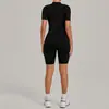 Mono de Yoga de Color Arena Otoño con Cuello Alto y Media Cremallera Traje Fitness Todo en Uno para Mujer Mono Deportivo de Alta Intensidad 2630