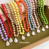 Nuevo collar acrílico de perlas barrocas transfronterizo europeo y americano, cadena para la clavícula de diseño único, accesorio moderno y versátil