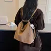 Bolso tote texturizado vintage de alta gama para mujer, nuevo modelo 2026, bolso de hombro casual simple, mochila versátil y elegante