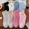 Calcetines de forro polar de coral para mujer de importación, calcetines cortos de color liso con puntos antideslizantes, calcetines de toalla, calcetines para el hogar
