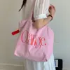 Bolsa Tote com Cordão Estilo Coreano Cor Sólida Estampa de Letras Transfronteiriça Bolsa Pequena de Lona Fresca Feminina Grande Capacidade para o Dia a Dia Bolsa de Ombro Único
