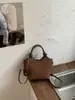 Bolsas de palha tecidas de alto valor para mulheres 2026 novas bolsas transversais da moda elegantes bolsas tote simples bolsas de balde
