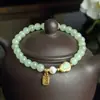 Pulsera de Jade Hetian Natural Material Boca Amarilla Ruoqiang para Damas DIY Jade Hetian Agua Soleada Degradado Estilo Nacional Diseño de Cuerda de Cuentas