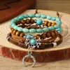 Nuevo sombrero de vaquero occidental transfronterizo con cabeza de toro turquesa, pulsera de cordón elástico multicapa, juego de varias piezas, pulsera de cuentas