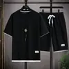 Conjunto esportivo masculino de verão com mangas curtas, para uso transfronteiriço, camiseta e shorts de corte solto, roupas de tecido waffle, vestuário casual versátil masculino