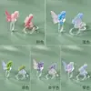 Exquisito sentido del diseño color claro mariposa rosa pendientes de resina pendientes Joker diarios suaves al por mayor