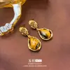 Brincos de Argola Maillard Olho de Tigre Gota d'Água Prata Moda Europeia e Americana Brincos Elegantes Nicho Outono e Inverno Brincos de Alta Qualidade para Mulheres