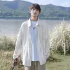 Camisa versátil a rayas con protección solar de manga larga para hombre, estilo coreano, fina de verano, holgada, con caída, tipo chaqueta, blanca a la moda