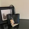 Nova bolsa de ombro retrô minimalista 2026 para mulheres, grande capacidade, casual, para o trabalho, bolsa tote com textura trançada