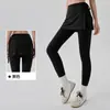 Falda de yoga de una pieza transfronteriza que cubre el trasero para mujer, minifalda de fitness anti-vergüenza, pantalón corto de falda deportiva para correr y entrenamiento anti-exposición