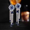 Pendientes de lujo ligeros de alta gama para la industria pesada, con forma de camelia y aguja de plata s925, con borlas largas de gota de agua y rosas para mujer.