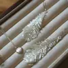 Pendientes de Borla de Pluma de Cisne Hechos a Mano con Cuentas Estilo Hada Tejidos Pendientes Largos Pendientes Ligeros de Lujo para Damas