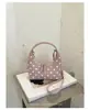 Bolsa de Poá com Design de Nicho Feminina 2026 Nova Moda Outono Bolsa Transversal Super Quente Essenciais do Dia a Dia Bolsa Pequena de Mão