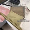 Camisola Bonita Sin Espalda de Nuevo Estilo 2025 con Tirantes Finos Integrados, Sujetador de Copa Fija y Almohadillas en el Pecho para Mujer