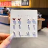 Pendientes combinables puesto de mercado nocturno al por mayor Corea del Sur pendientes explosivos simples diseño de nicho femenino pendientes de moda con temperamento