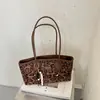 2026 Nuevo Otoño Invierno Retro Nicho Gamuza Felpa Bolso Moda Femenina Versátil Hombro Único Mate Bolsillo de Mano Bolso Tote