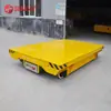 Vehículo de Transporte de Equipo Pesado a Batería con Acoplamiento Automático y Transferencia de Piezas sobre Rieles en el Suelo en el Taller