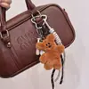 Colgante Oso Frijol Estilo Miu Colgante de Bolso con Cuerda para la Mano Peluche de Béisbol Lindo Llavero de Peluche de Dibujos Animados