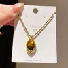 Brincos de Tarraxa Irregulares Olho de Tigre Banhados a Ouro 14K Conjunto Versátil Maillard de Corrente para Suéter Nicho Alto Padrão para Mulheres