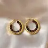 Brincos Olho de Tigre Estilo Melanoid Retro Senso de Design de Nicho Brincos Versáteis Luxo Leve Moda de Alta Qualidade Brincos de Tarraxa para Mulheres