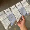 Calcetines Nuevos de Media Pantorrilla para Otoño e Invierno, Calcetines Deportivos, Letras Color Café Gracia, Mismo Color, Cómodos y Transpirables, Venta al por Mayor por Fabricante