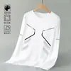 Camiseta de manga larga de otoño, capa base talla grande, cuello redondo para hombre, top simple y holgado, estilo coreano, camiseta estampada de moda
