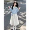 Conjunto estilo coreano para meninas para primavera e outono: conjunto de duas peças com top moderno de manga longa com gola de marinheiro e uma saia doce com laço