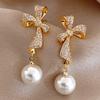 Pendientes de perla con lazo de Corea Dongdaemun con colgante de perla con lazo de diamantes completos, elegantes pendientes de celebridades de Internet para mujeres