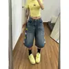 Calça Camuflada Versátil Lavada Desgastada Scimitar para Homens e Mulheres Estilo de Rua Americano Solto Tendência Jeans Estrela