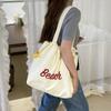 Bolso de Hombro con Letras Impresas de Nicho Ins de Corea del Sur Bolso Tote de Moda Versátil con Cierre de Cordón Gran Capacidad Bolso de Viaje para Estudiantes