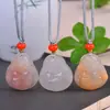 Colgante de hebilla de seguridad de jade blanco de seda dorada de Xinjiang natural delfín Tianzhu calcedonia joyería frijol de bendición auspiciosa colgante de cadena de suéter