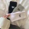 Calcetines mujer desodorantes absorbentes de sudor invierno con felpa ins modernos combinan con todo letra deportivos engrosados de buena apariencia calcetines de pareja