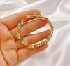 Novos braceletes de miçangas transfronteiriços europeus e americanos, pulseiras elásticas arco-íris, estilosos e versáteis, acessórios elegantes para feriados atacado