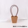 Cesta de flores portátil para flores, bolsa de papel Kraft impermeable, caja para arreglos florales, materiales de embalaje de regalo de mano, venta al por mayor, una generación de cabello