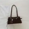 Bolso de hombro de moda estilo motocicleta para mujer, nuevo modelo 2026, bolso de mano para el día a día, bolso tote pequeño para salir a trabajar, bolso baguette