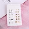 Nuevos aretes de flor con gancho, aretes largos con borla de perlas, estilo de celebridad de Internet japonesa y coreana, mismos aretes para mujer, aretes de perlas
