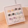 Pendientes Youmo Doudou para Mujer Primavera 2026 Nuevos Pendientes de Resina Venta al por Mayor Dulce Fresco Nicho Estilo de Alta Gama