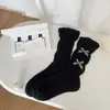 Calcetines de punto de estilo Ins coreano a cuadros con lazo pequeño, cinta, color liso, encaje, hasta la mitad de la pantorrilla, holgados para mujer, calcetines lindos Lolita
