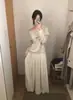 Em Estoque Inverno 2025 Novo Estilo Coreano Dongdaemun Mo*Oha Blusa de Tricô Slimming Off-Shoulder Manga Longa