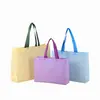 Bolsas de tela no tejida tridimensionales, gruesas, en stock y de moda, adecuadas para tiendas de ropa, centros comerciales y como bolsas de compras ecológicas.; se puede personalizar con un logo