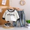 Sudadera de Hombros Descubiertos para Niños Estilo Inglés Primavera y Otoño 2025 Nuevo Estilo Coreano Infantil Cuello Redondo Una Pieza Envío Directo