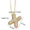 Europa y Estados Unidos transfronterizo oro caliente collar de 26 letras incrustado circonita hueco cobre chapado en oro clip de collar cadena de cuentas al por mayor